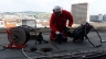 Vysokotlakové čistenie strešnej vpuste na výškovej budove